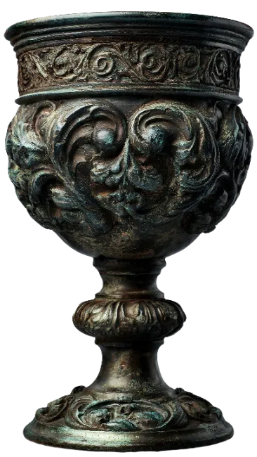 Ancient Ornate Bronze Chalice with Detailed Relief Carvings