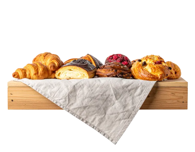 Assorted Baked Pastries on Wooden Crate