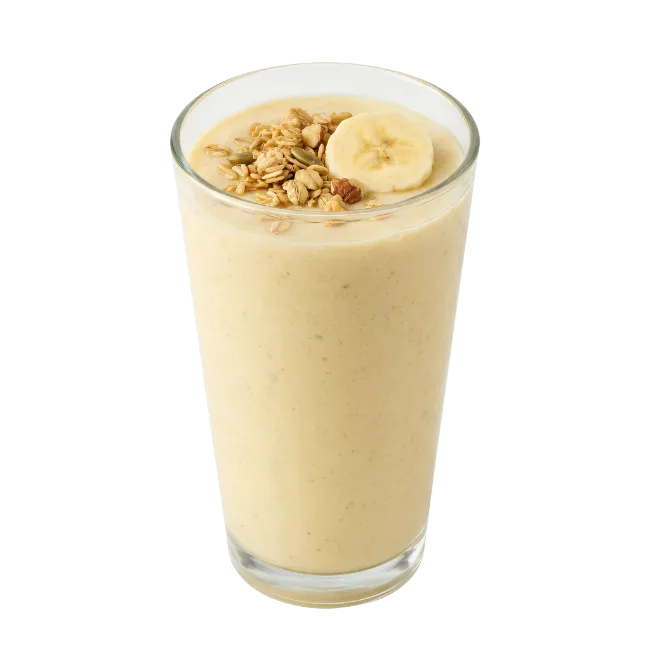 Banana Smoothie in Glass with Granola Topping