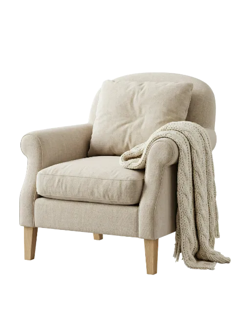 beige upholstered armchair with throw blanket