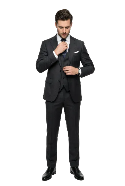 Businessman in a Dark Suit Adjusting Tie
