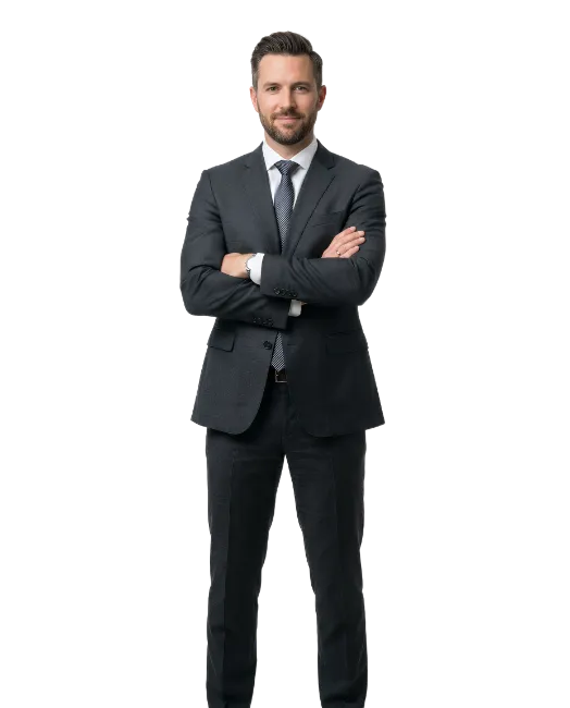 Businessman in dark suit standing with crossed arms