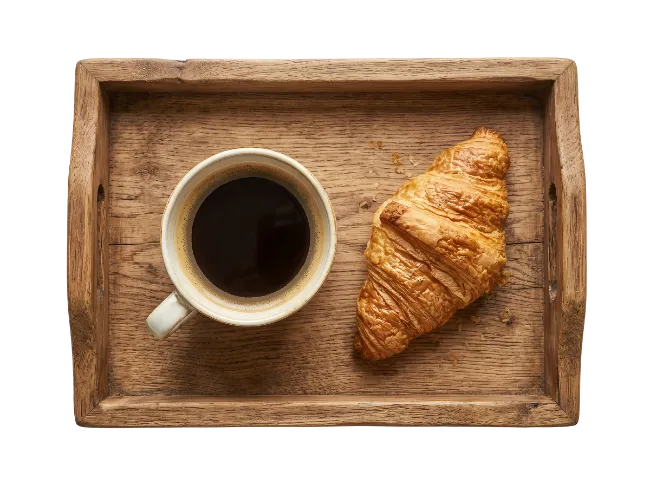 Coffee and Croissant on Wooden Tray
