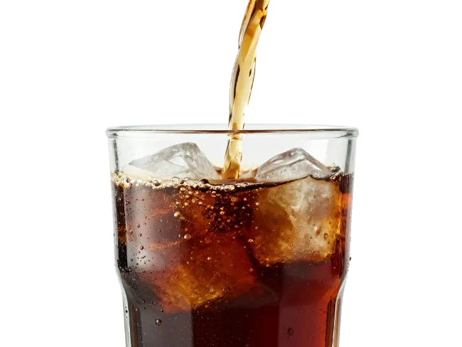 Cola Pouring into Glass with Ice Cubes