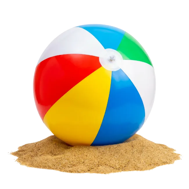 Colorful beach ball resting on sand