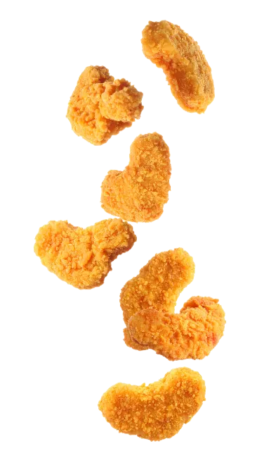 Crispy Golden Chicken Nuggets Falling