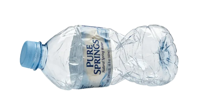 Crushed plastic water bottle isolated