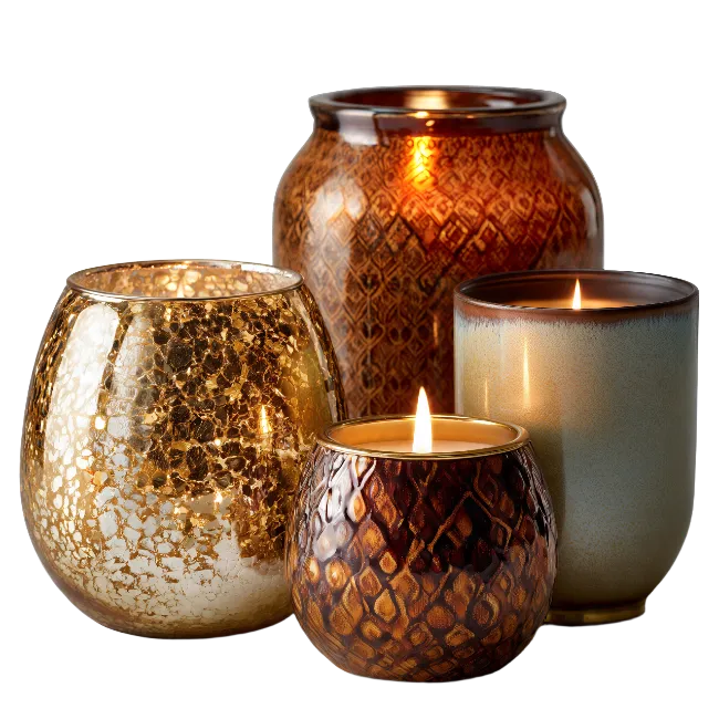 Decorated scented candles in glass holders