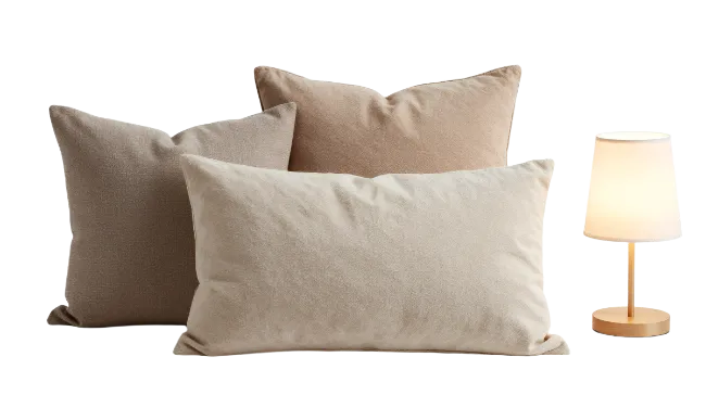 decorative pillows and small bedside lamp