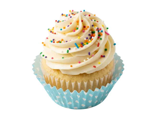 Delicious cupcake with vanilla frosting and rainbow sprinkles