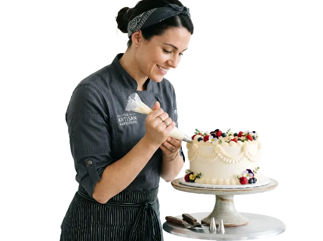 Female Baker Decorating a Berry Cake