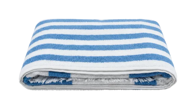 Folded blue and white striped beach towel