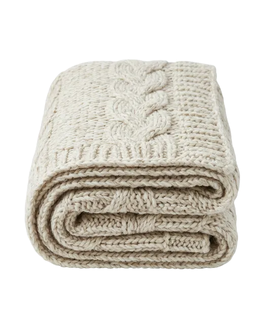 Folded Cream Cable Knit Blanket