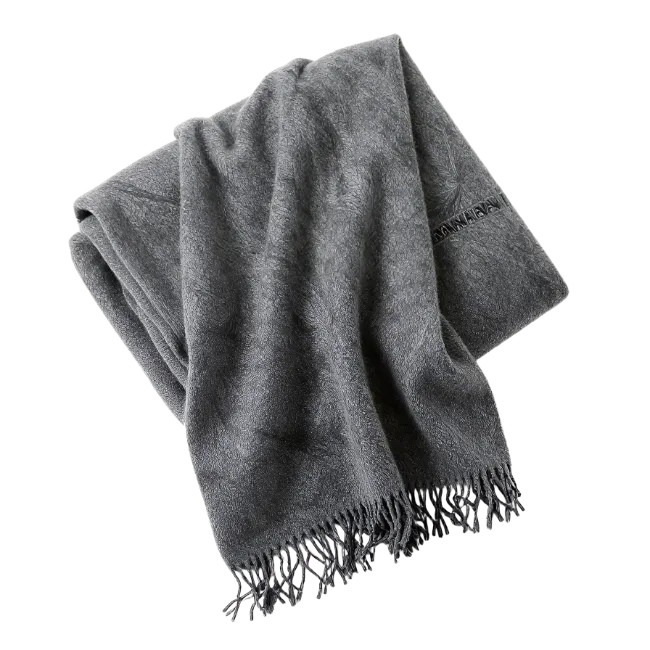 Folded Gray Wool Blanket With Fringe
