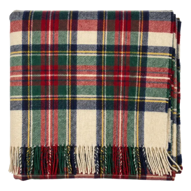 Folded tartan plaid blanket with fringe
