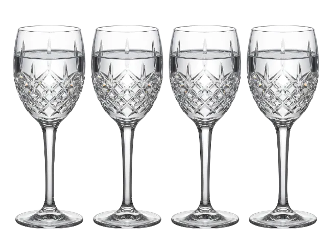 Four Crystal Wine Glasses Filled With Water