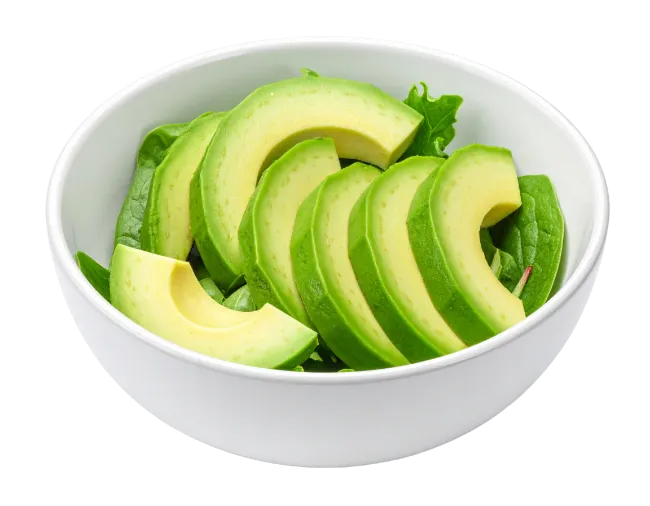 Fresh Avocado Slices in White Bowl