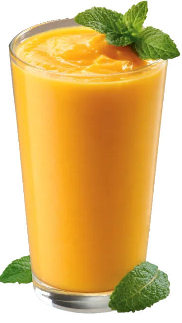 Fresh Mango Smoothie in Glass with Mint Leaves