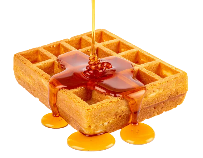Fresh Waffle Drizzled With Sweet Golden Honey