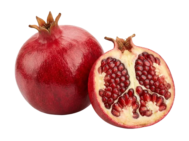 Fresh whole and sliced pomegranate fruit