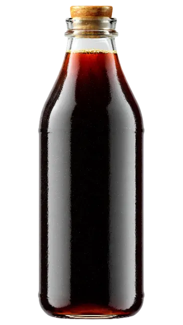 Glass Bottle Filled With Dark Beverage