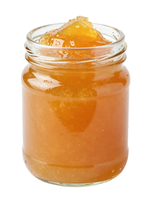 Glass Jar Filled With Golden Apricot Jam