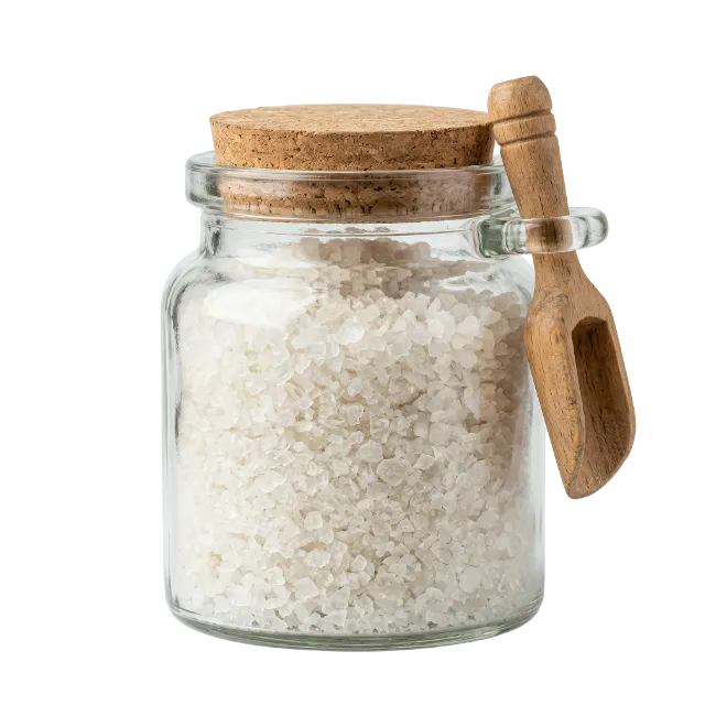 Glass Jar with Coarse Salt and Wooden Spoon