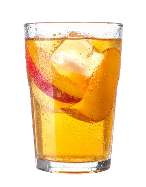 Glass of iced peach tea with fresh fruit slices