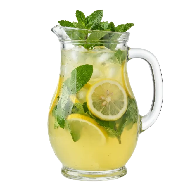 Glass pitcher of lemonade with lemon slices and mint leaves