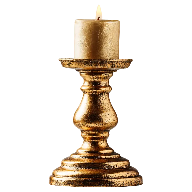 Gold candlestick with lit candle