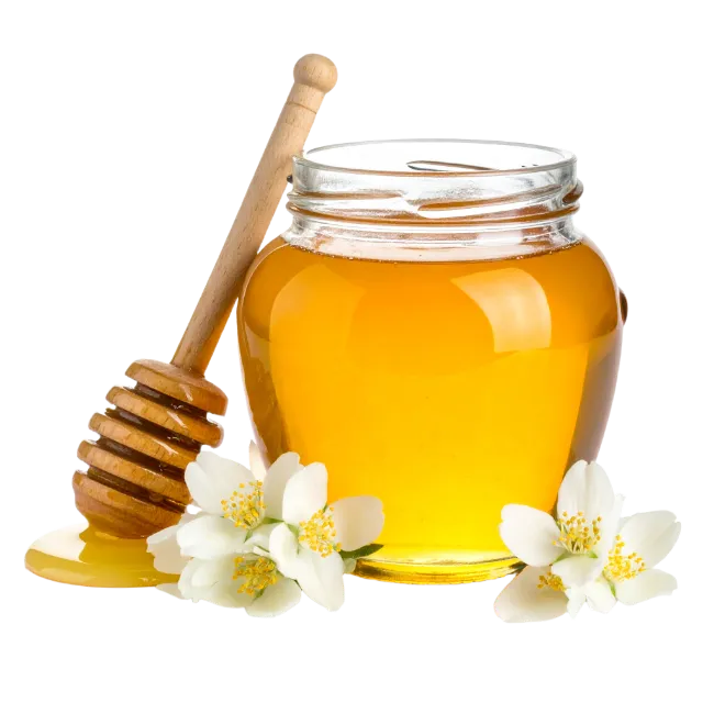 Jar of Honey with Wooden Dipper and White Flowers