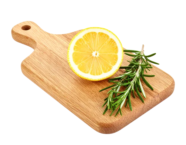 Lemon and Rosemary on Wooden Cutting Board