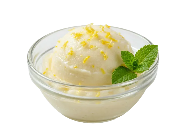 Lemon sorbet in a glass bowl with mint