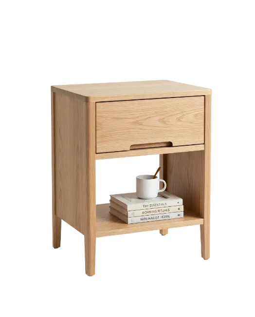 Light Wood Nightstand with Books and Mug