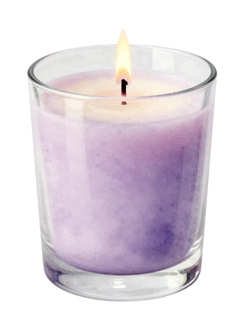 Lit purple scented candle in glass jar