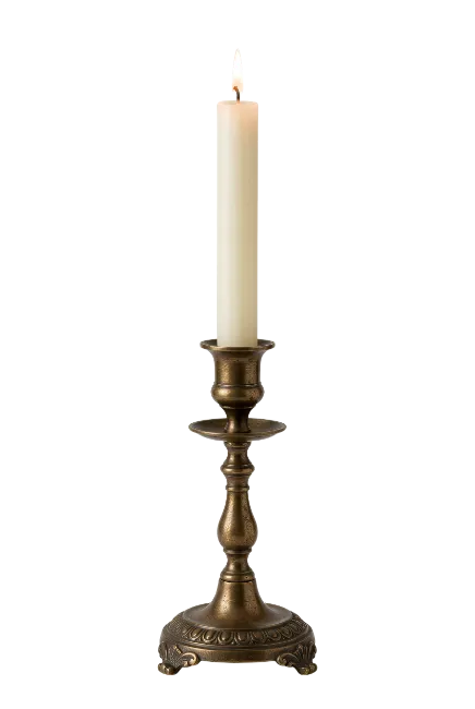 Lit White Candle in Antique Brass Candlestick