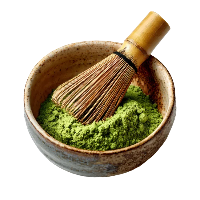 Matcha Green Tea Powder in Ceramic Bowl with Bamboo Whisk