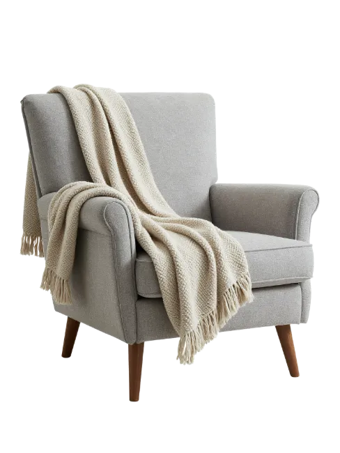 Modern Gray Armchair with Knitted Throw Blanket