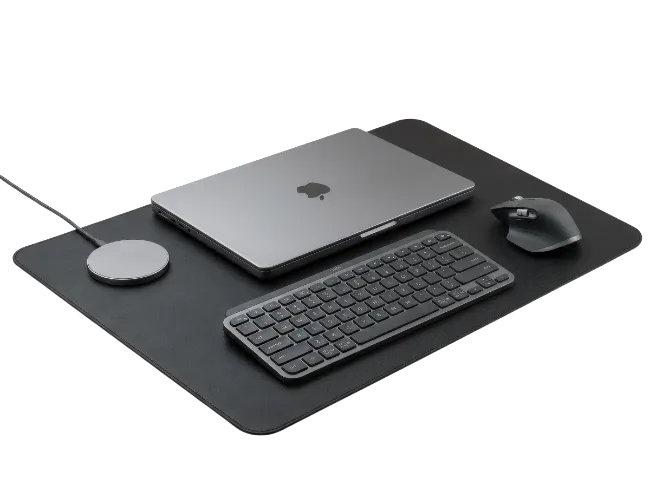 Modern Laptop Desk Setup with Keyboard and Mouse