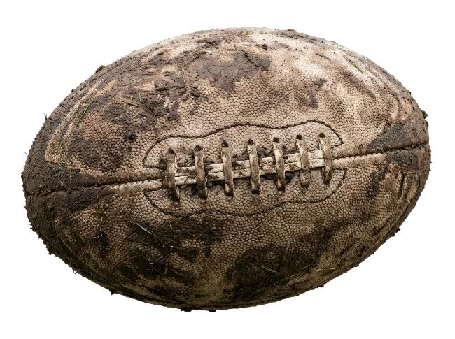 Muddy American football isolated