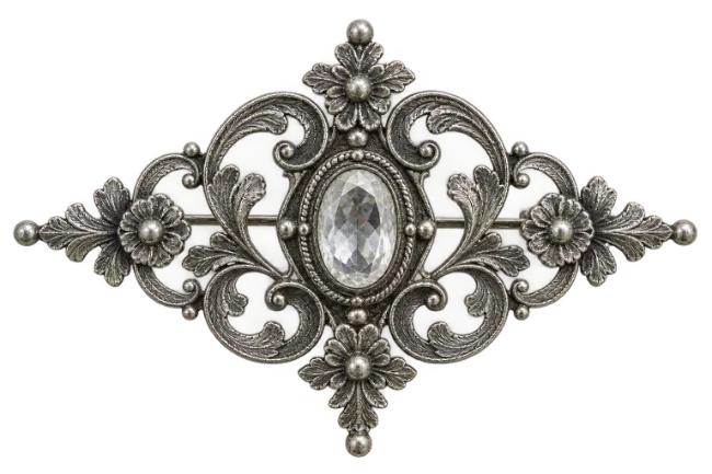 Ornate Silver Brooch with Central Crystal