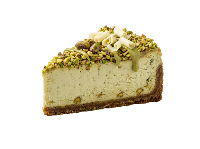 Pistachio Cheesecake Slice with White Chocolate Curls