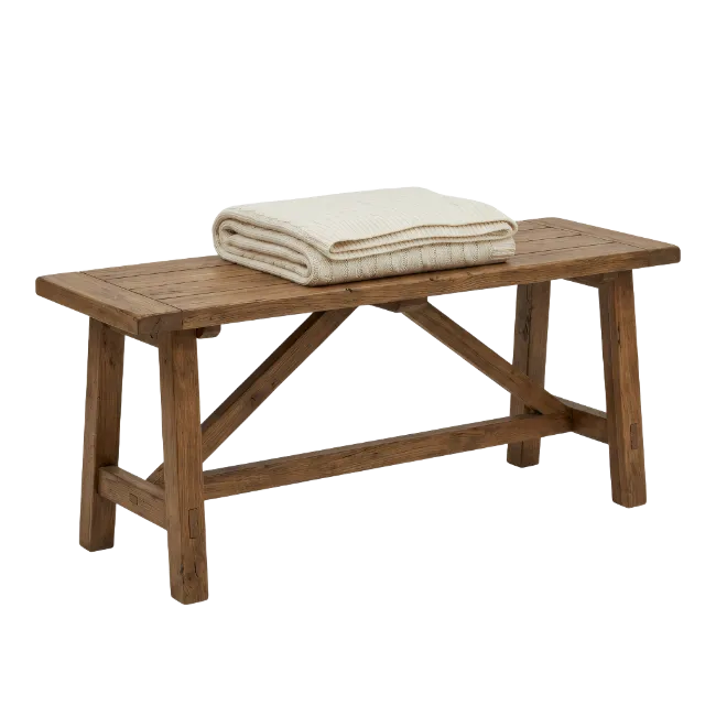 Rustic Wooden Bench with Cream Throw Blanket