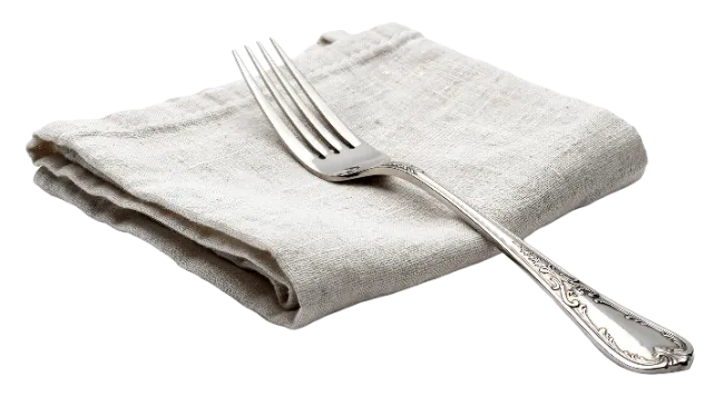 Silver Fork on Linen Napkin
