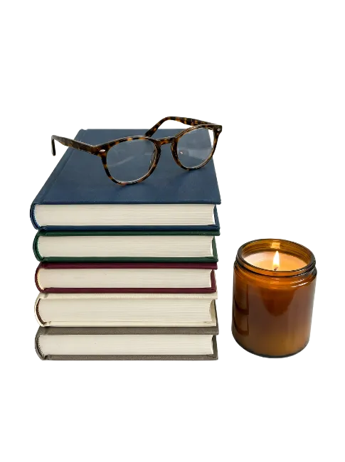 Stack of Books with Glasses and Candle