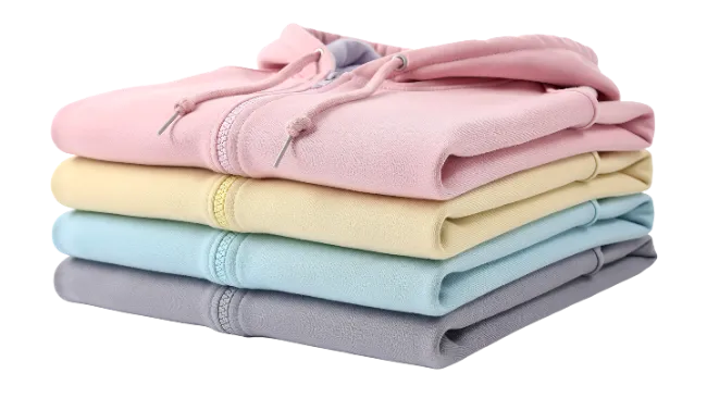 Stack of folded hoodies in pastel colors