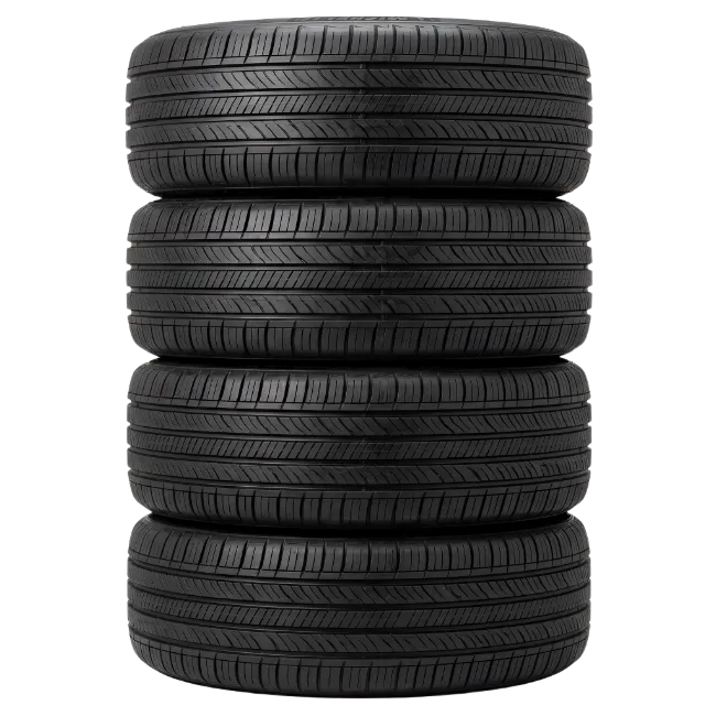 Stack of four black car tires