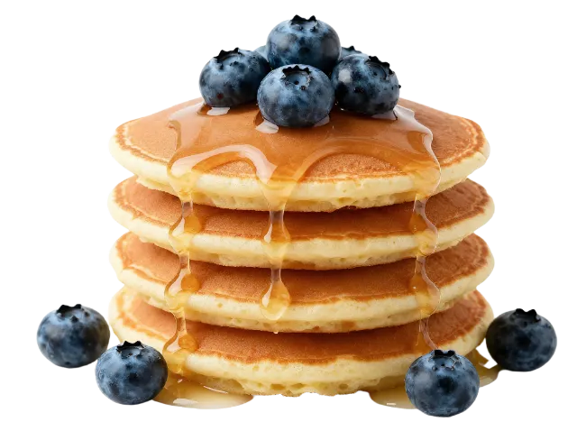 Stack of pancakes with blueberries and syrup