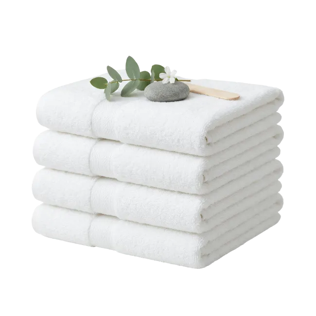 Stack of white towels with spa elements
