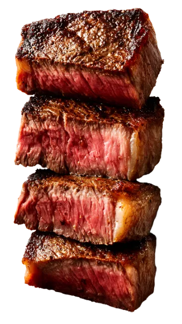 Stacked juicy grilled beef steaks